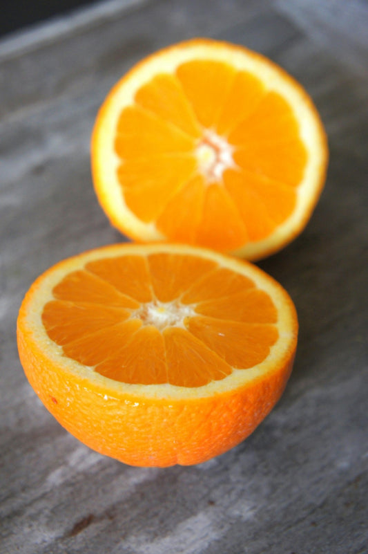 Brighten Up: Unleash the Radiant Power of Oranges in Your Skincare Routine - Sundara Aura